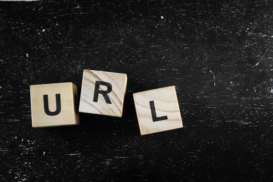 Wooden Block words on black background.