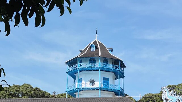 Historic Sangga Buwana Tower at the Surakarta Palace complex in Surakarta, Central Java, Indonesia, featuring traditional Javanese architecture under a clear blue sky.