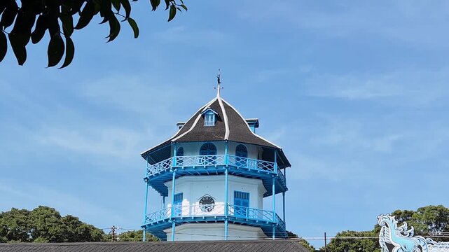 Historic Sangga Buwana Tower at the Surakarta Palace complex in Surakarta, Central Java, Indonesia, featuring traditional Javanese architecture under a clear blue sky.