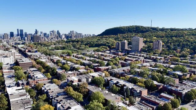 Aerial view of Eglise Saint Enfant Jesus and autumn cityscape in Montreal, Quebec, Canada. g.
