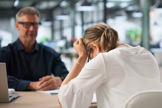Two Office Workers Discuss Hiring Mistake During Tense Disciplinary