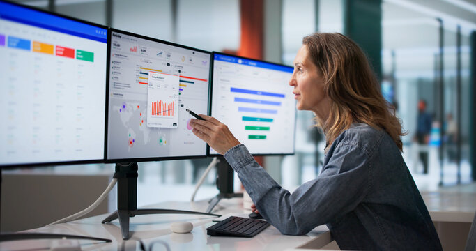 Marketing Manager Reviews Campaign Performance Data