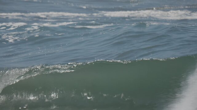 Giant shorebreak waves crashing at the wedge