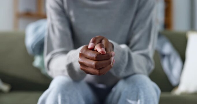 Hands, nervous and person with anxiety for counseling, anticipation or habit for coping mechanism. Patient, fidget and worry on sofa with stimming, trauma response and self control for emotional ptsd