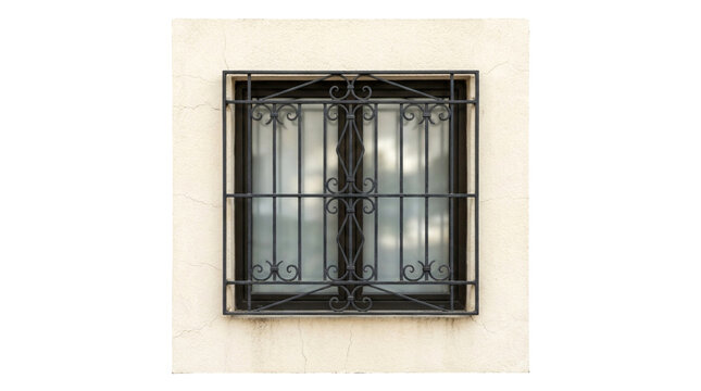 A square window with a decorative black wrought iron security grille set into a textured beige stucco wall