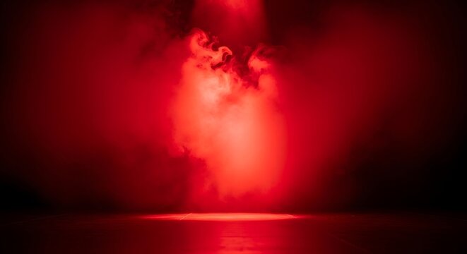 A dark room with a red spotlight shining through smoke