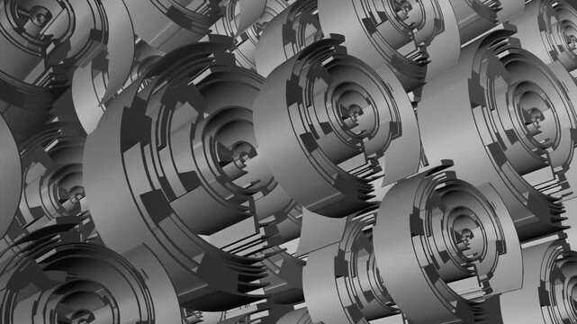 A closeup view of multiple metallic gears with circular patterns