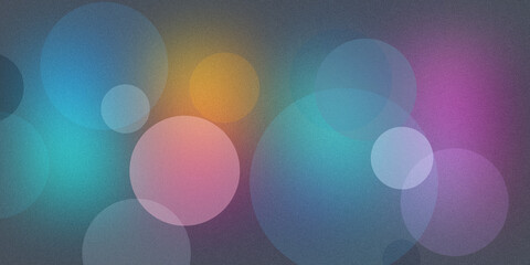 Abstract background with colorful translucent bubbles of various sizes, creating a soft and dreamy bokeh effect. © SmartVector Studio