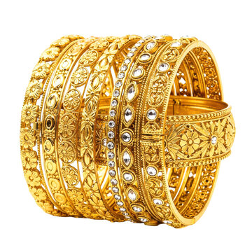 Stack of ornate gold bangles adorned with intricate floral patterns and sparkling clear crystals displaying luxurious traditional Indian jewelry fashion.