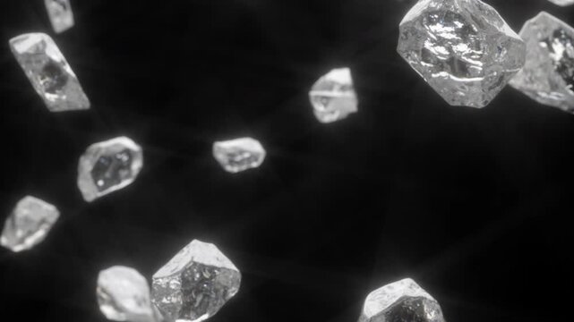 Multiple raw diamond crystals of varying sizes fall against deep black background with glossy specular highlights on each facet