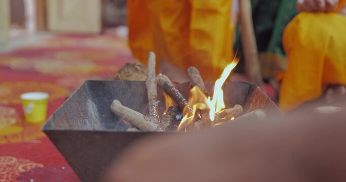 Holy Fire Ritual (Havan Yajna) with Ghee Ahuti in Hindu Religious Ceremony