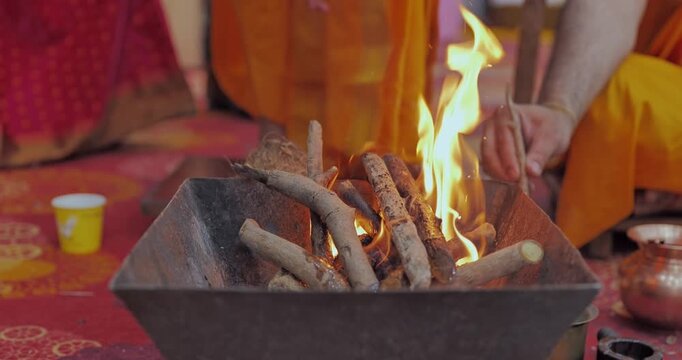 Holy Fire Ritual (Havan Yajna) with Ghee Ahuti in Hindu Religious Ceremony