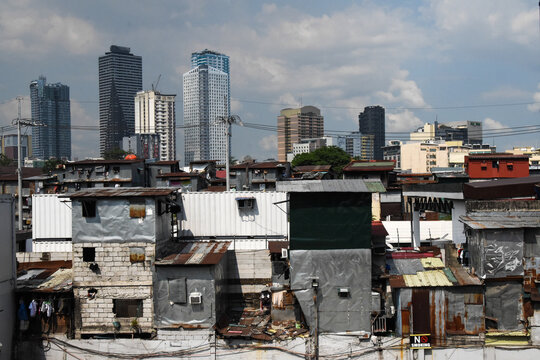 Slum shanty douses. Philippines poverty scene. Manila urban poor community. Houses with metal sheets as wall and roof. 