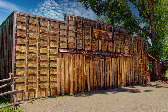 Beautiful Wooden Drake Livery Stable at the Pierre Wibaux Museum in Wibaux Montana.  The Front is Decorated with Local Ranch Brands.