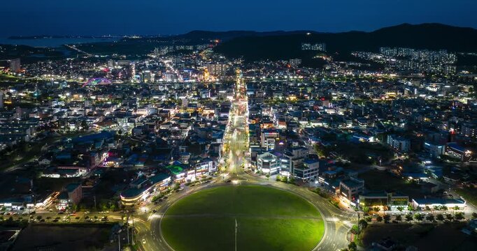 Aerial hyperlapse of Boryeong city roundabout from sunset to night, South Korea