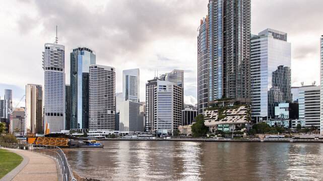 Mix of high-rise residential and commercial towers along the riverbank