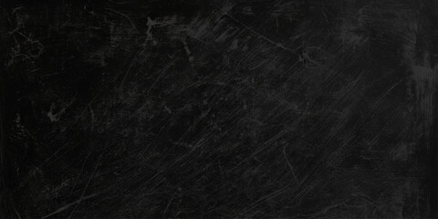 Dark scratched blackboard background with white chalk marks and scratches for writing or drawing, Empty space for text or design © Daiyan
