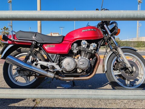 Ostia, Rome, Italy - March 5, 2026, detail of a Honda CB750K, a street motorcycle produced between 1978 and 1983, parked on the seafront.