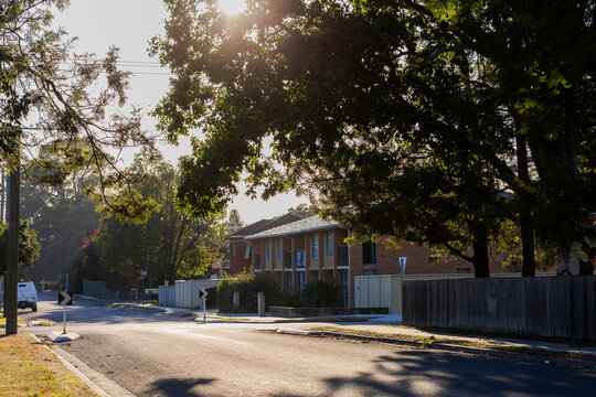 double story unit homes in apartment block along street