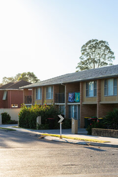 Australian and kangaroo flags hanging from balcony of unit home