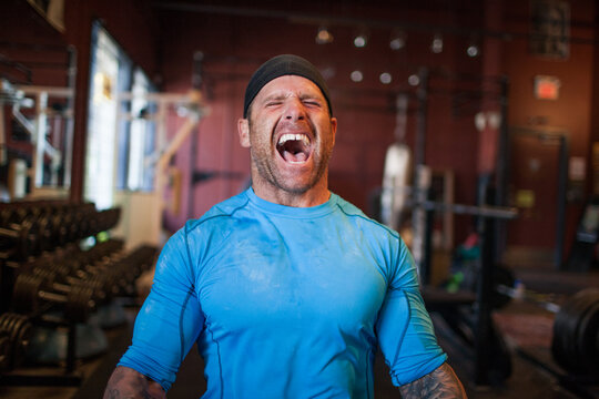 Athlete screaming during an intense workout
