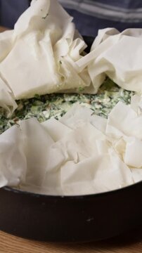 Covering Filling With Phyllo Dough Close Up Front View Vertical