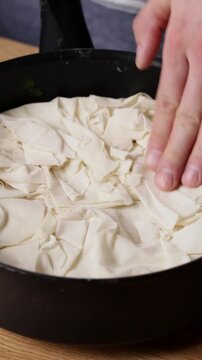 Pressing Phyllo Dough Close Up Front View Vertical