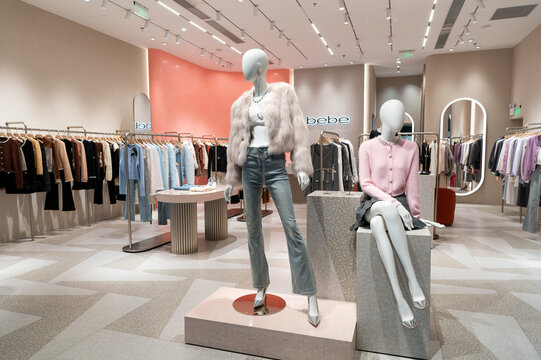Dressed mannequins in Bebe store at KK Mall