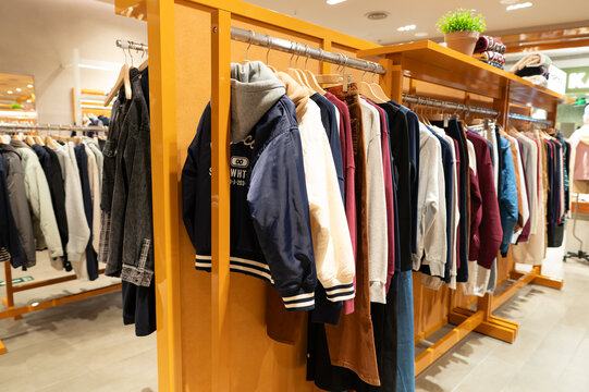 Apparel displayed on racks inside I.T store at KK Mall