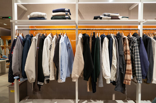Apparel displayed on racks inside I.T store at KK Mall