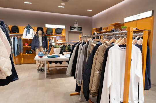 Apparel displayed on racks inside I.T store at KK Mall