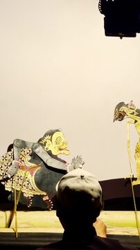 Vertical Wayang Performance With Puppets