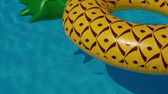 blue and yellow pool float floating on water, inflatable ring in swimming pool, summer vacation, blue water, yellow float, pool toy, leisure, relaxation, tropical resort, sunny day, hol