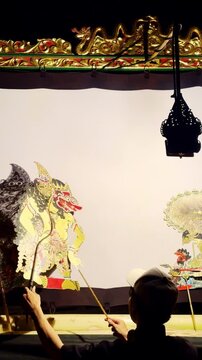 Vertical Wayang Puppets On Stage