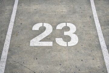 Fototapeta premium A numbered parking spot in a busy parking lot