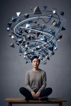 Persona seduta mentre un vortice di forme geometriche fluttua sopra la testa, simbolo di pensieri intrusivi, sovraccarico mentale e processi cognitivi complessi. Immagine concettuale e moderna.