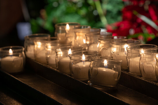 Burning votive candles in a quiet church interior

Description
Burning votive candles in glass holders creating a warm spiritual atmosphere for prayer, remembrance and quiet reflection.