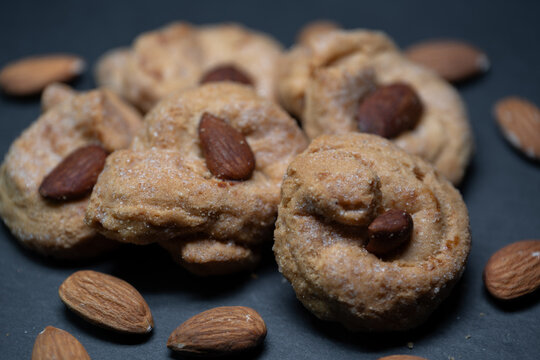Soft cookies with a whole almond on top.