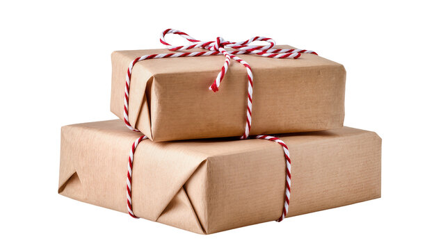 Isolated two stacked presents wrapped in kraft paper tied with red and white striped baker's twine.