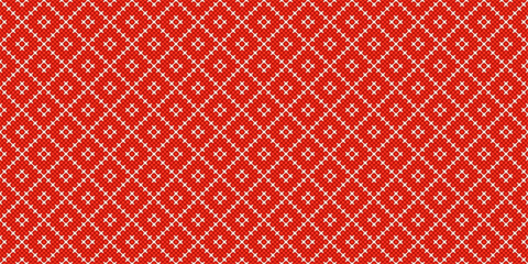 Christmas pattern, red winter background with white ornament. Cozy cross stitch embroidery, hygge style bg. Seamless holiday fabric texture with diamonds, Christmas sweater design. Vector illustration © chizhovao