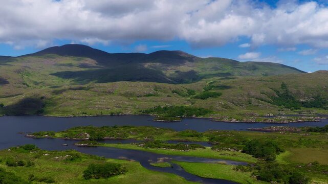 Cinematic Drone Journey Across Wild Irish Mountains and Peaceful Killarney Lakes in Bright Summer Light