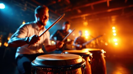 Fototapeta premium This image captures a dynamic drum performance on stage, showcasing the energy and passion of musicians under dramatic lighting during an exhilarating live concert.