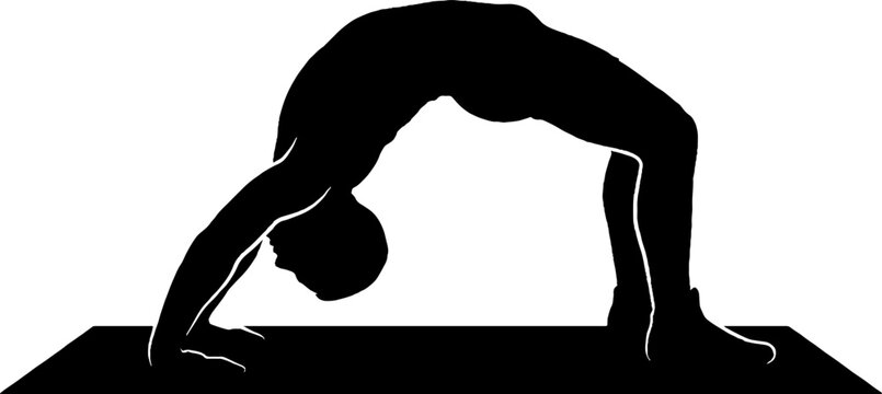 Silhouette of person performing backbend yoga pose.