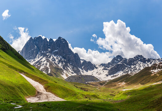 mountain landscape with blue sky stepantsminda,  caucasus, georgia,