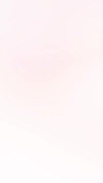Minimalist soft white and pink vertical gradient background loop. Clean elegant design for commercial beauty brand advertising, vertical slideshow overlays, and aesthetic smartphone screen savers