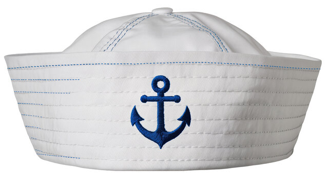 Isolated white sailor hat with blue anchor emblem and decorative stitching, nautical fashion accessory.