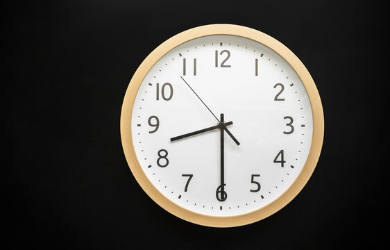 Wall clock showing 8:30
