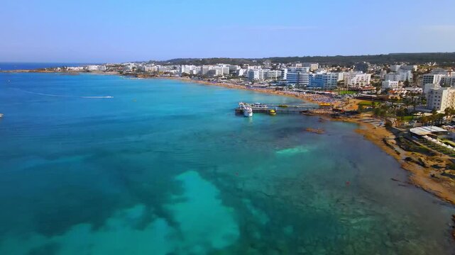 Aerial Drone View of Protaras Cyprus, Luxury Beachfront Hotels, Golden Sandy Beach and Crystal Clear Mediterranean Sea