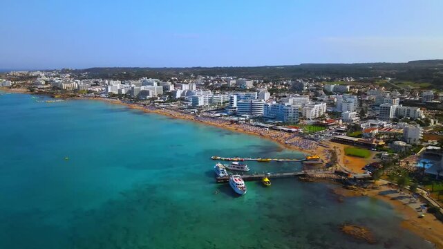 Aerial Drone View of Protaras Cyprus, Luxury Beachfront Hotels, Golden Sandy Beach and Crystal Clear Mediterranean Sea