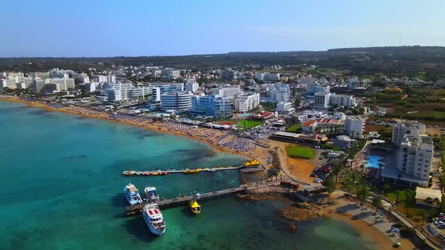 Aerial Drone View of Protaras Cyprus, Luxury Beachfront Hotels, Golden Sandy Beach and Crystal Clear Mediterranean Sea